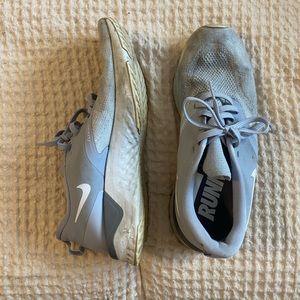 Grey Nike running shoes